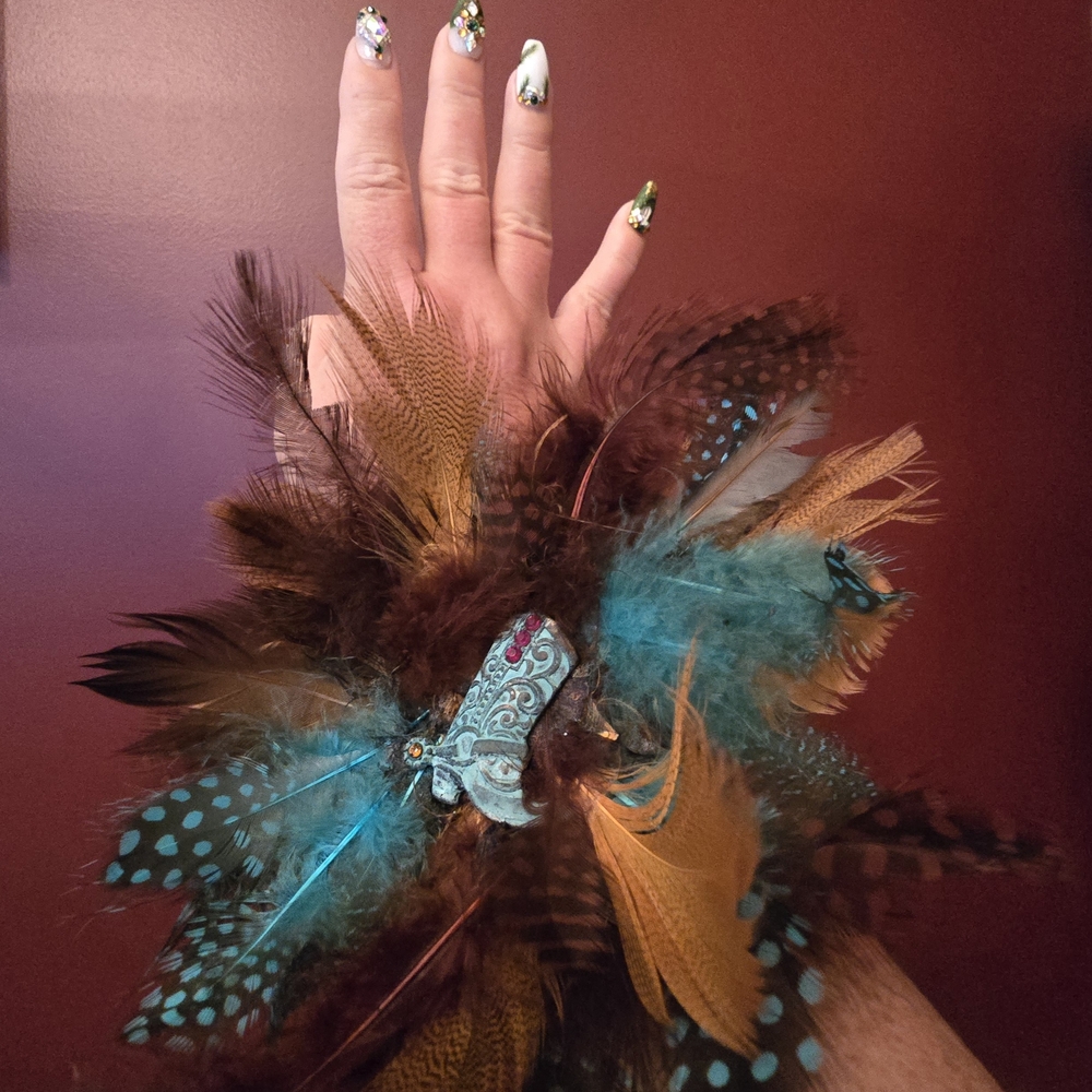 Elegant Feathered Bracelet with Boot Detail